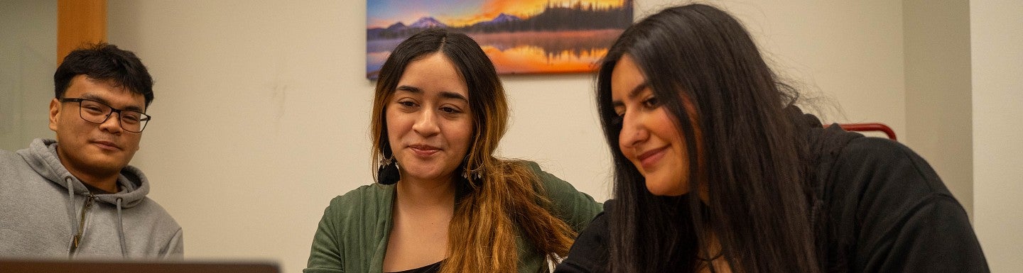 Two students in an advising meeting